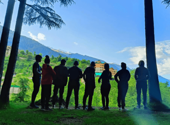 Group Silhouette in Mountain Valley