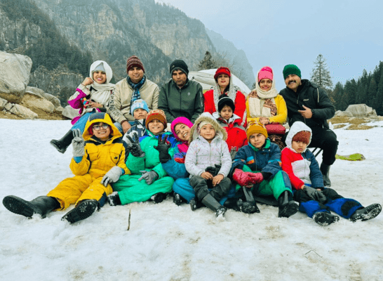 A cheerful group of adults and children